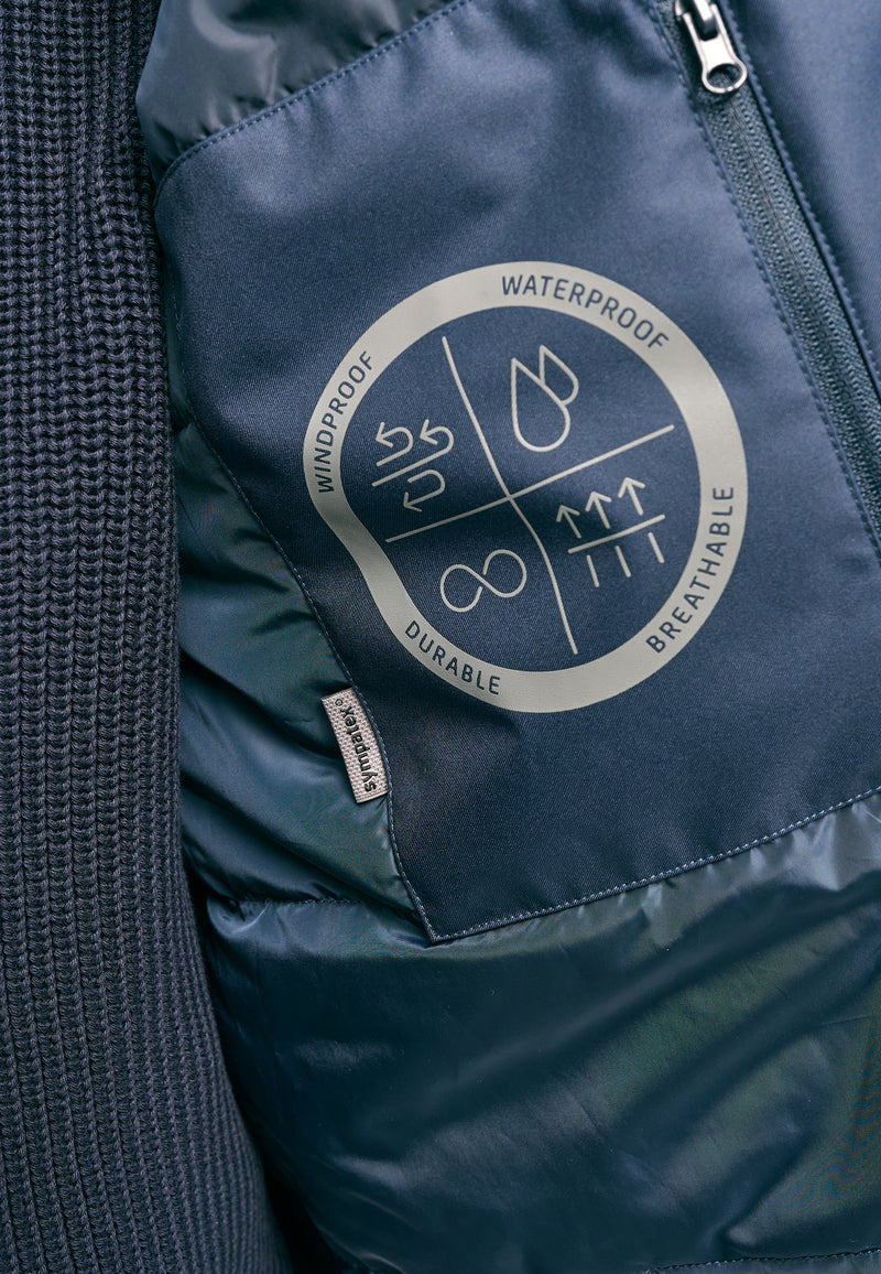 Dominik ist 1.91m und trägt Größe L