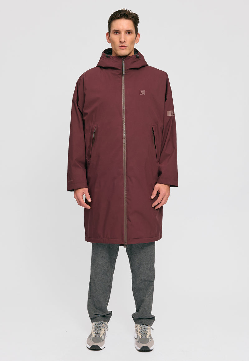 Dominik ist 1.91m und trägt Größe L