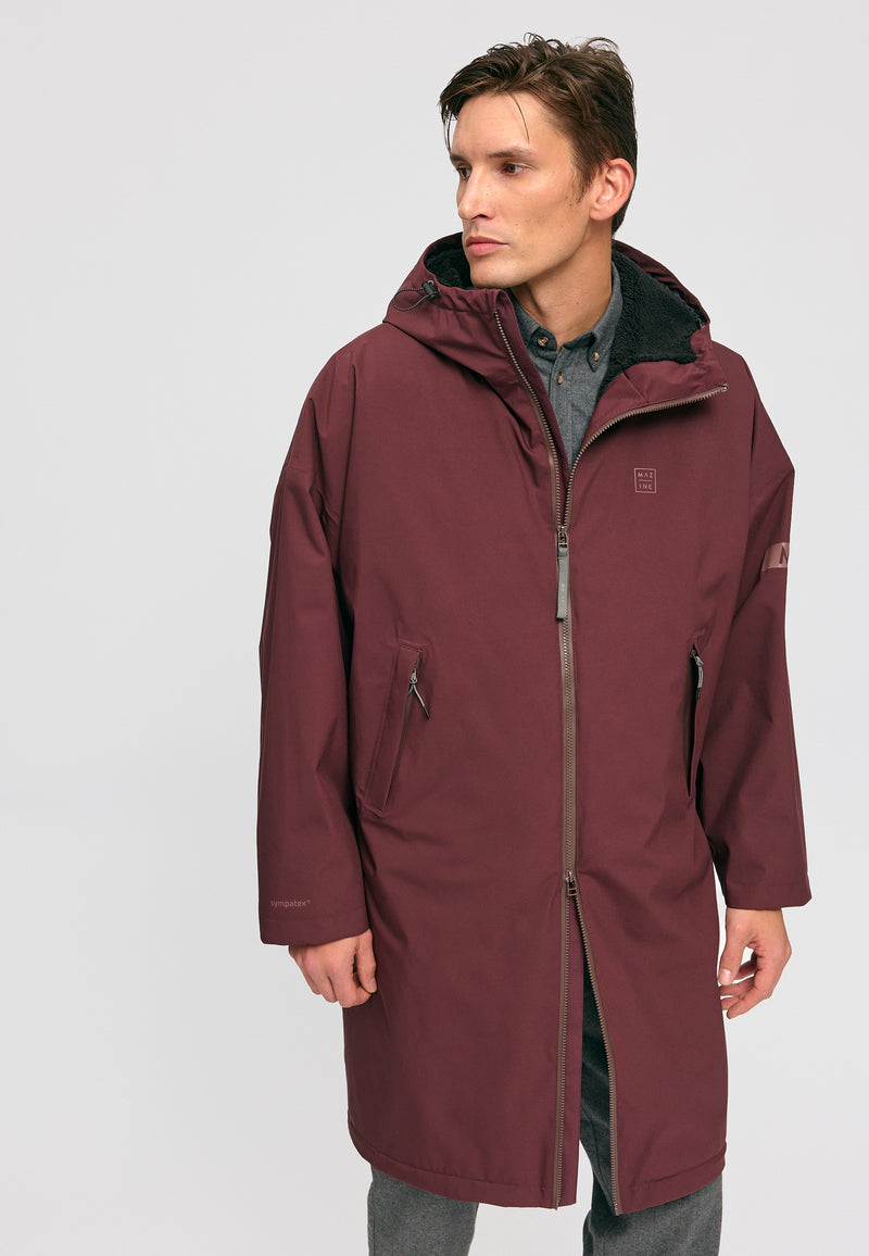 Dominik ist 1.91m und trägt Größe L