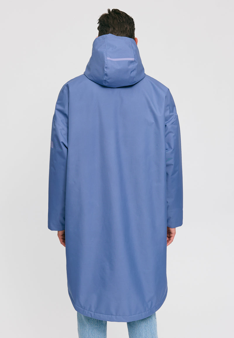 Dominik ist 1.91m und trägt Größe L