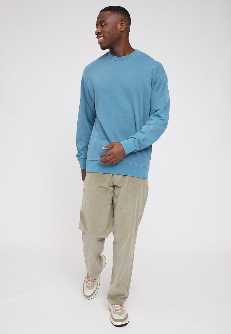 Julia ist 1,78 und trägt Größe S | Terence ist 1,90 und trägt Größe L