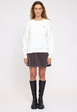 Angelique ist 1,75 und trägt Größe S