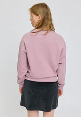 Amber ist 1,74 und trägt Größe S